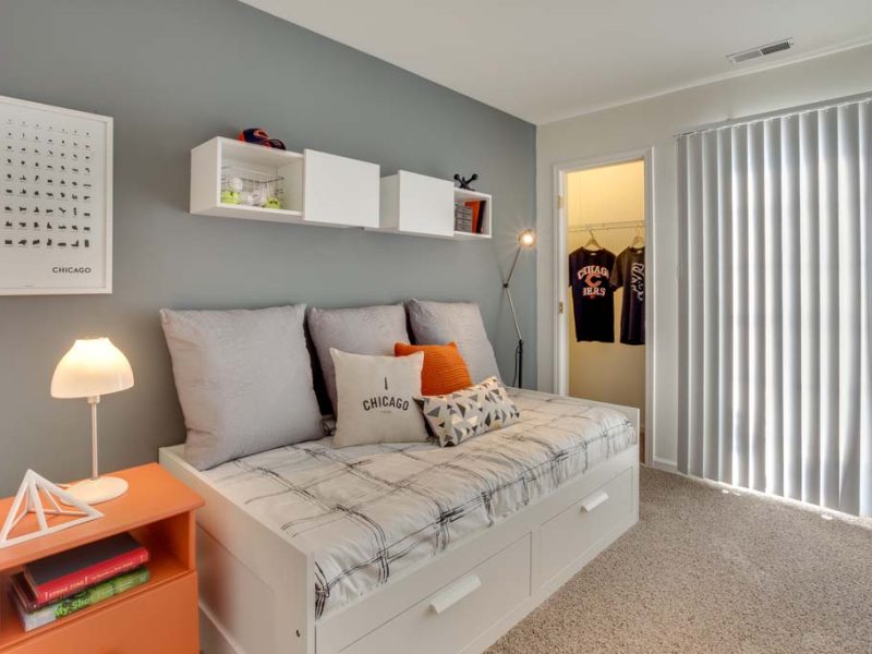 This image shows a spacious bedroom open floor plans with extra storage available. It also features the accessible walk-in closet to your comfort.