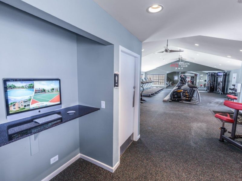 This image showcases the commercial fitness with a State-of-the-art athletic club with equipment that is essential for community amenities.