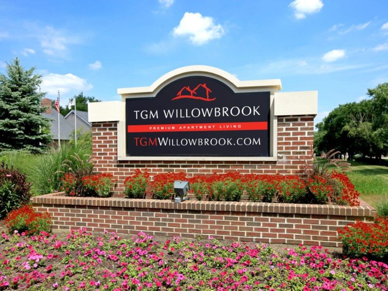 This image shows the gateway of the TGM Willowbrook Apartments that's only minutes away from downtown main street shopping.